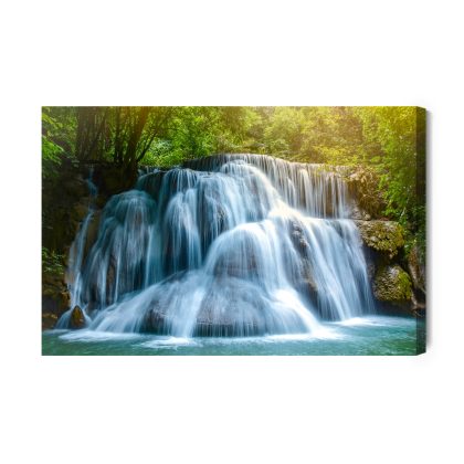 Canvas print Forest waterfall in the sun