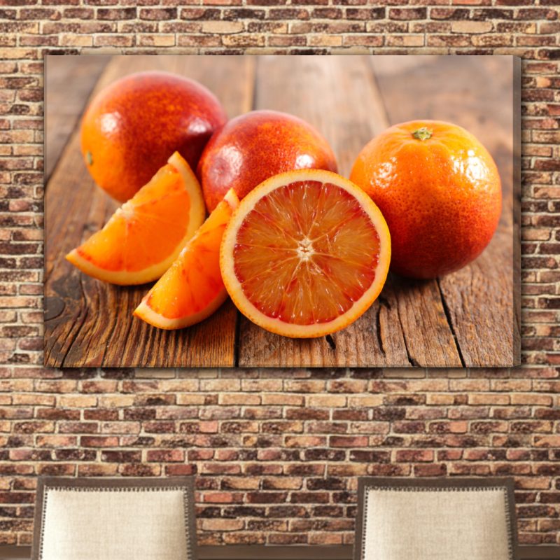 Leinwandbild: Rote Orangen – Saftiges Symbol für Sommer und Energie