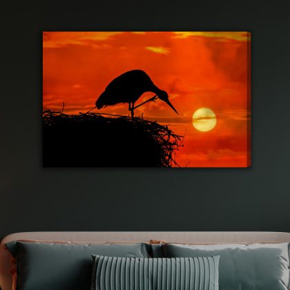 Canvas wall art: bird silhouette against a sunset