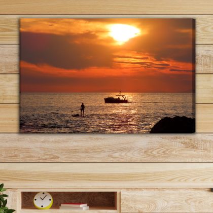 Modern Canvas Print: Paddleboard & Boat at Sunset – for living room & bedroom