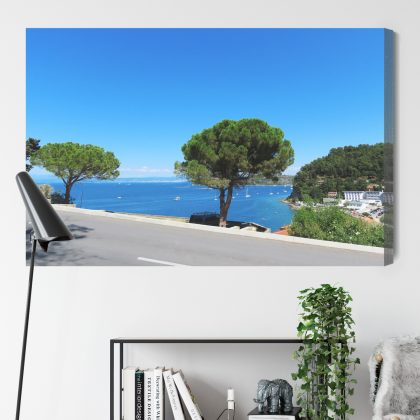 Canvas Print: Pines above an Azure Bay – sails and light for living room and office