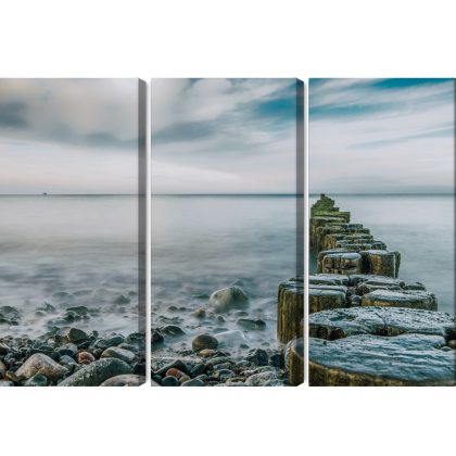 Multi-panel canvas wall art calm sea and wooden groynes