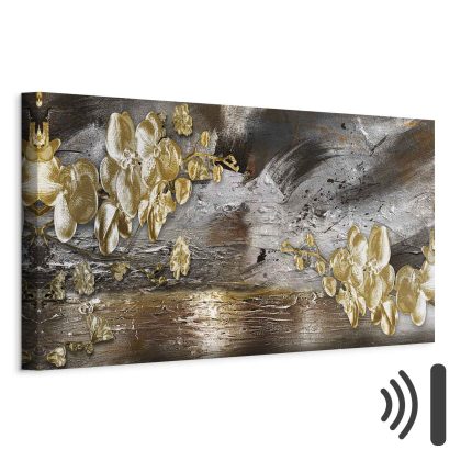 Wide canvas print with a golden floral motif