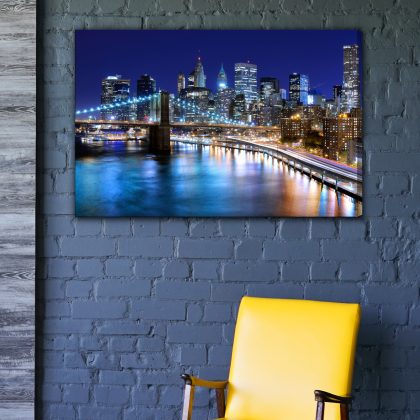 Night panorama of New York over the river. Canvas print.
